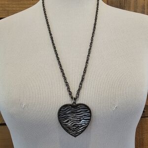 Zebra print heart pendant w/smoke color faceted stone and gunmetal chain